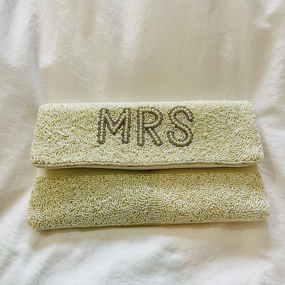 “MRS” handbag. Carried once for wedding shower. Gold colored strap detachable.